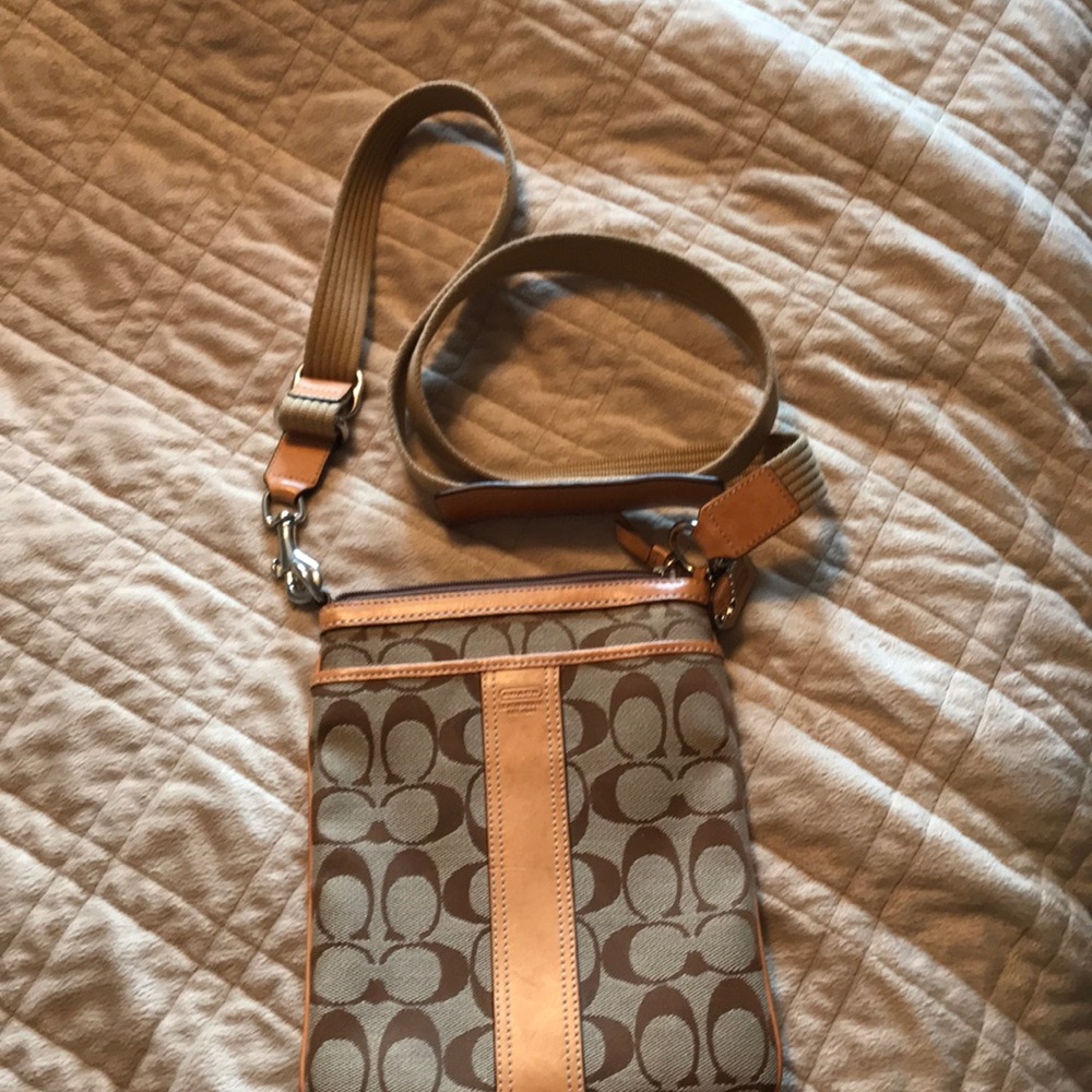 Tan fabric/leather trimmed coach crossbody